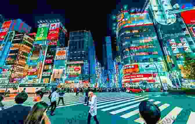 A Bustling Street Scene In Tokyo, Japan With People Crossing And Neon Lights Illuminating The Night Sky A Fortune Teller Told Me: Earthbound Travels In The Far East