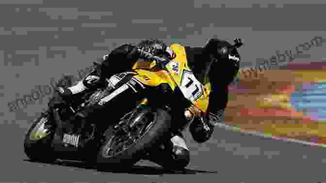 A Motorcyclist Practicing Cornering Techniques On A Racetrack The Joy Of Motorcycles: More Scraping Pegs