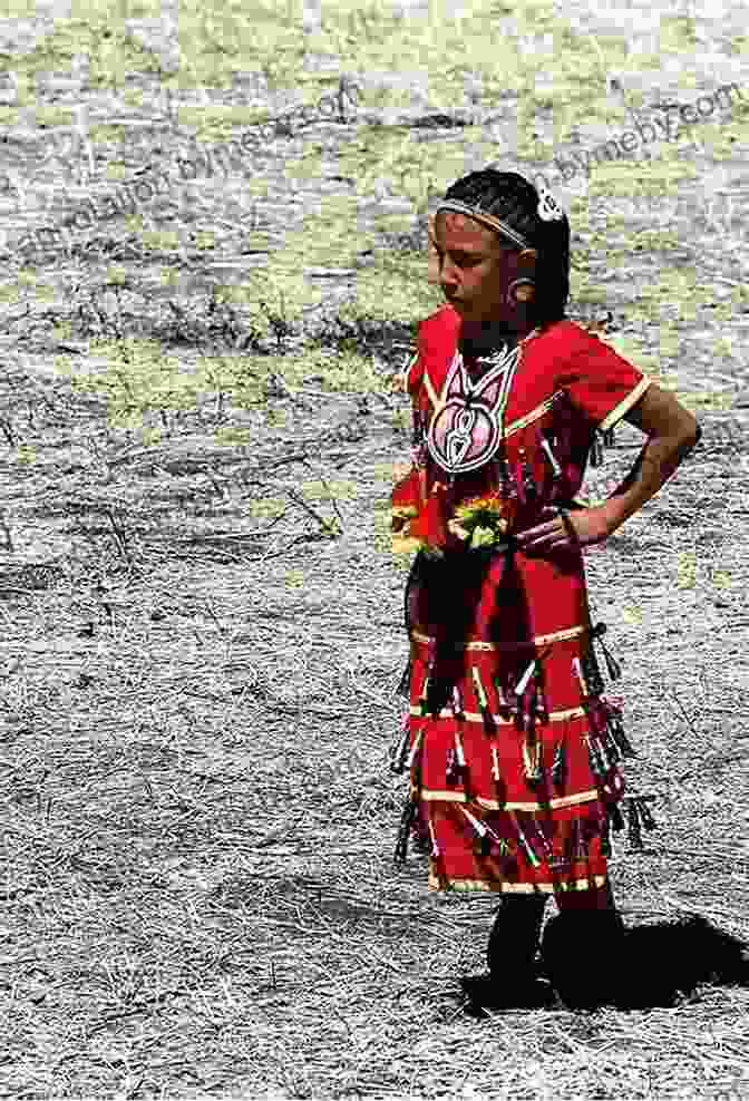 A Young Native American Girl, Dressed In Traditional Clothing, Stands Confidently Against A Backdrop Of The Great Basin. Native Peoples Of The Great Basin (North American Indian Nations)