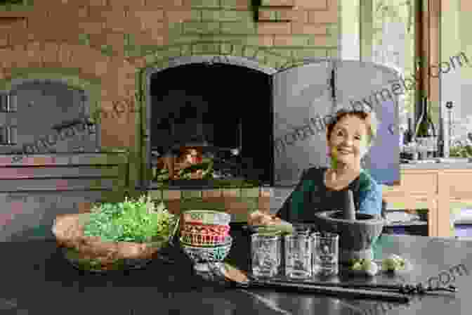 Alice Waters In Her Kitchen, Surrounded By Fresh Produce Alice Waters Cooks Up A Food Revolution