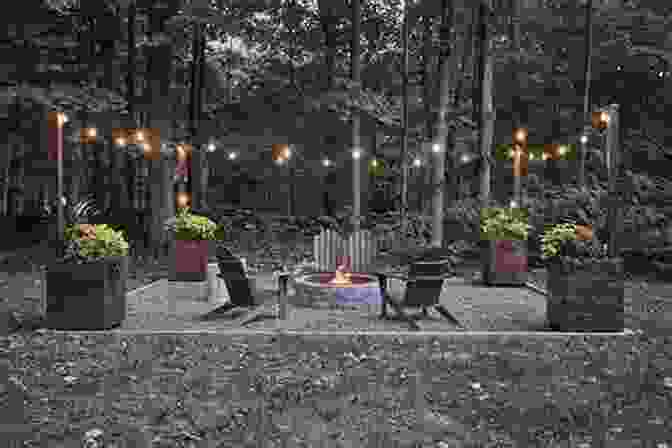 An Outdoor Living Room With Comfortable Seating, A Fireplace, And String Lights. Encyclopedia Of Landscape Design: Planning Building And Planting Your Perfect Outdoor Space