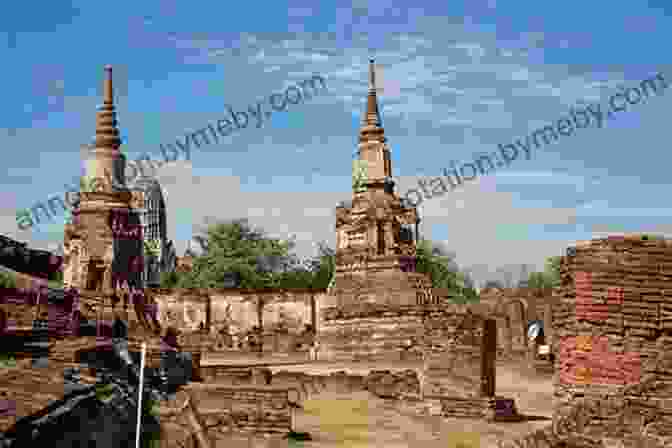 Atmospheric View Of The Ancient Ruins Of Ayutthaya, With Crumbling Temples And Lush Vegetation DK Eyewitness Thailand (Travel Guide)