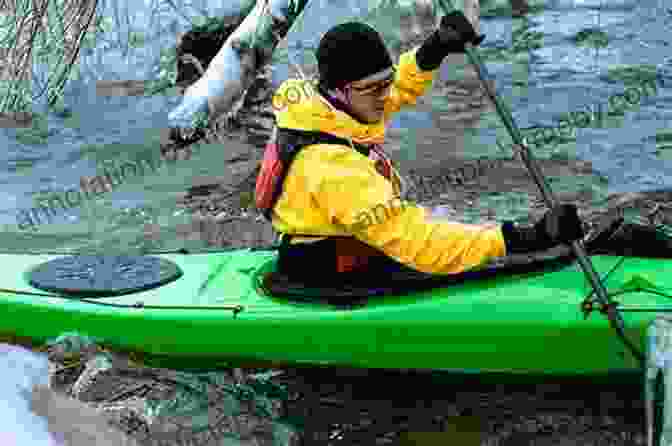 Sea Kayaker In Full Gear, Including Helmet, Life Jacket, And Dry Suit The Complete Of Sea Kayaking